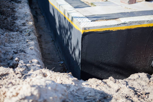 Professional Waterproofing technician working in Rockwood, MI
